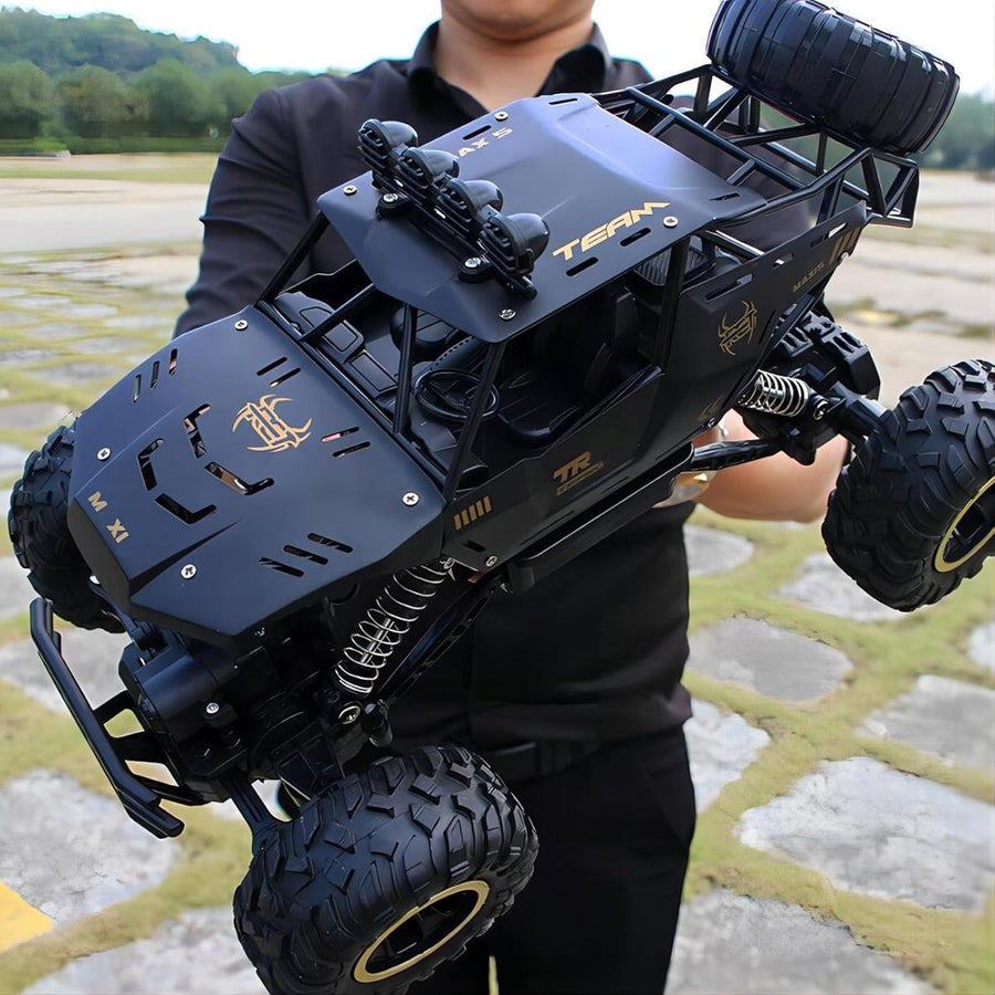 1:12 RC Monster Truck 4WD 2.4GHz Rock Crawler Metal Shell LED Car with 2 Batteri