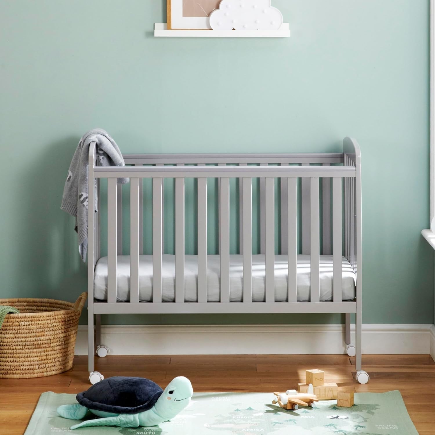 Space Saver Baby Cot Bed Adjustable Height with Wheels White Compact Crib Grey