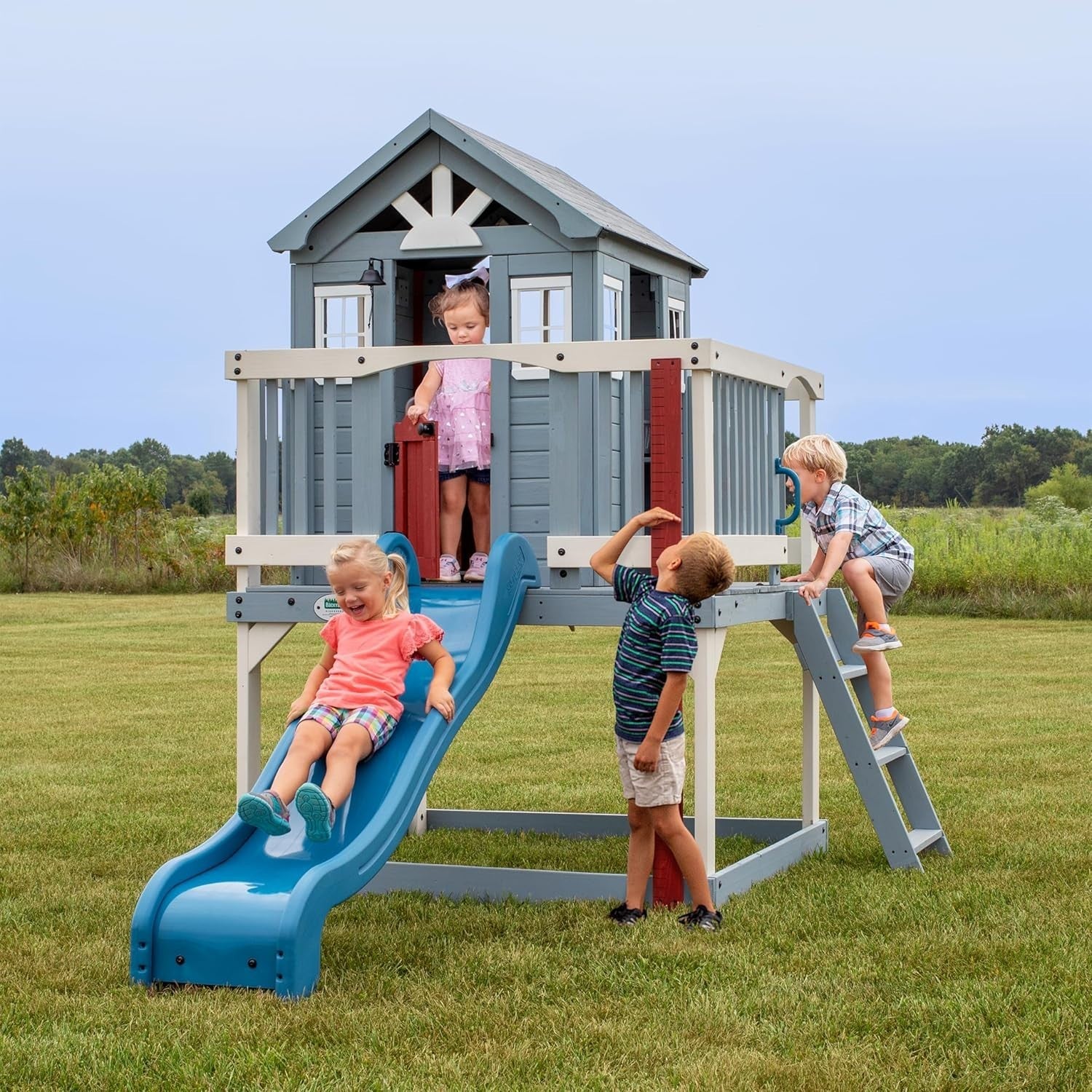 Elevated Cedar Kids Playhouse with Slide Toy Kitchen Growth Chart